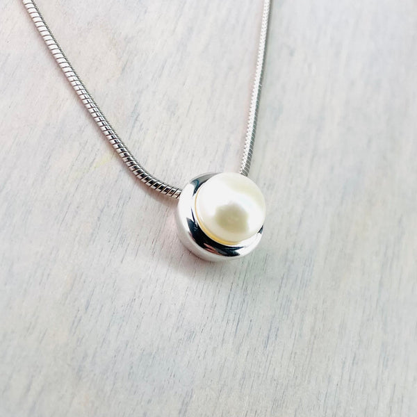 Simple Round Sterling Silver and Fresh Water Pearl Pendant by JB Designs.