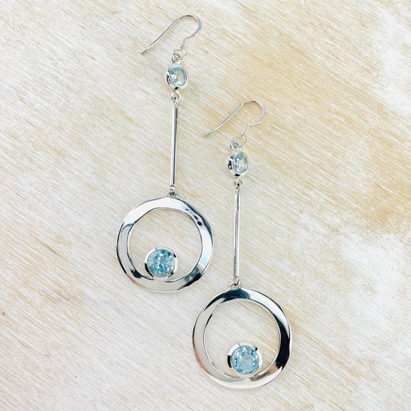 Long Sterling Silver and Blue Topaz Circle Earrings.