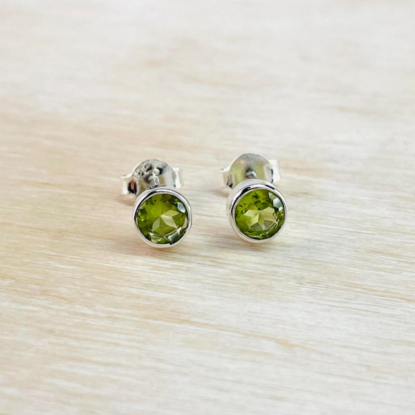 round faceted bright green peridot stones, simply set in silver.