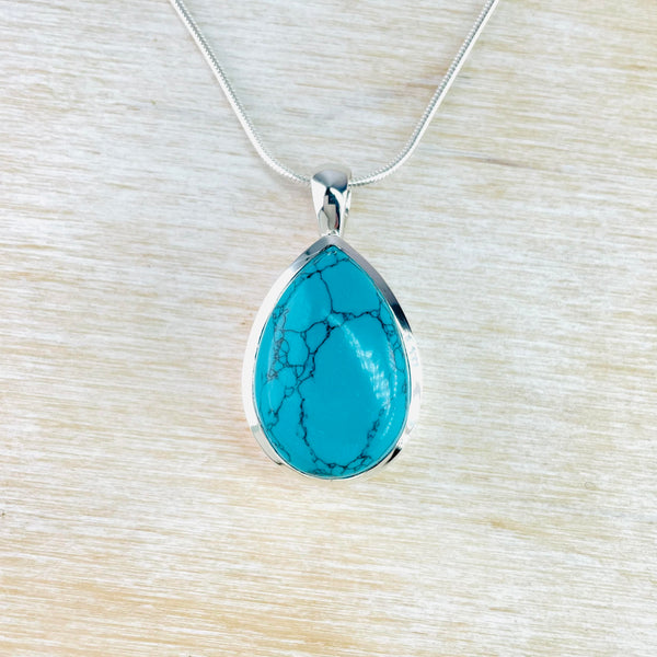 Chunky Sterling Silver and Tear Drop Shaped Turquoise Pendant.