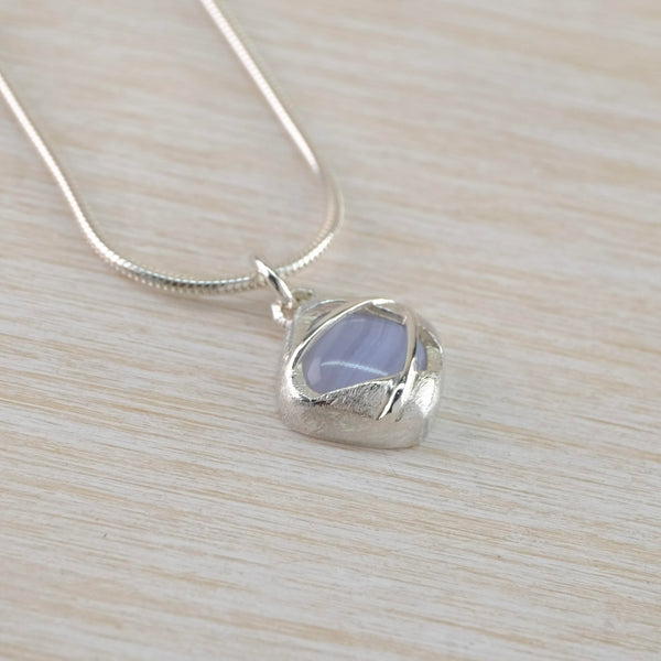Satin and Polished Sterling Silver and Blue Lace Agate Pendant.