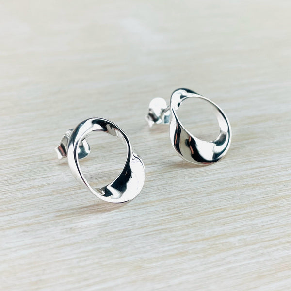 Polished Sterling Silver Curved Mobius Stud Earrings by JB Designs.