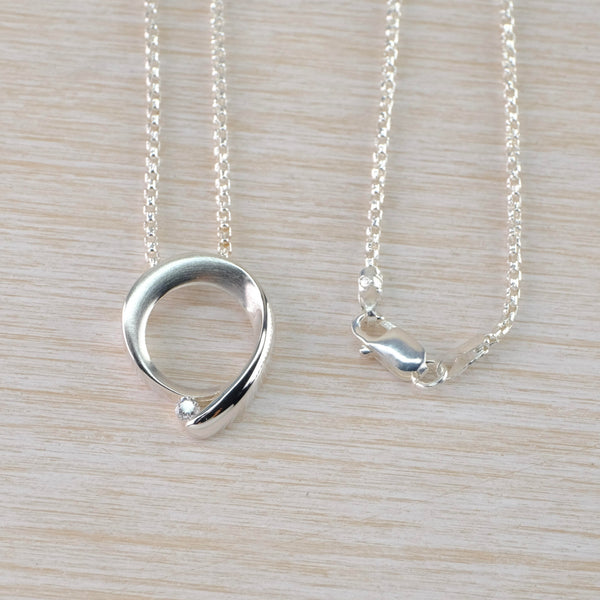 Satin and Shiny Sterling Silver Open Circle Pendant with Cz by JB Designs.