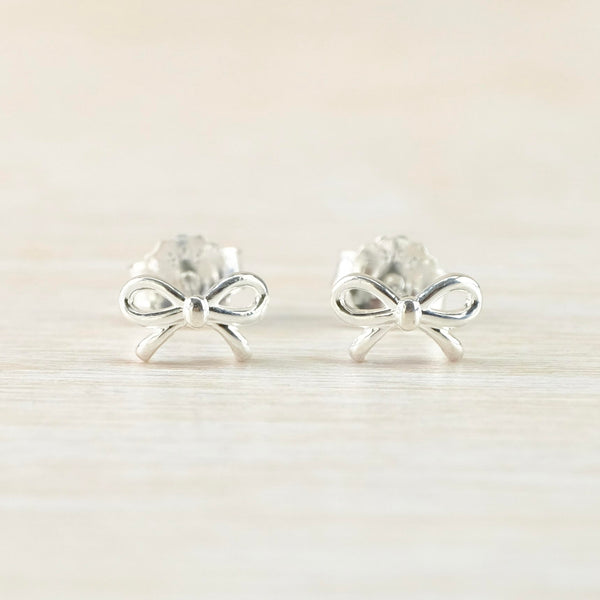 Simply a silver bow as a stud earring.