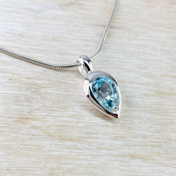 Inverted Tear Drop Blue Topaz and Sterling Silver Pendant by JB Designs.