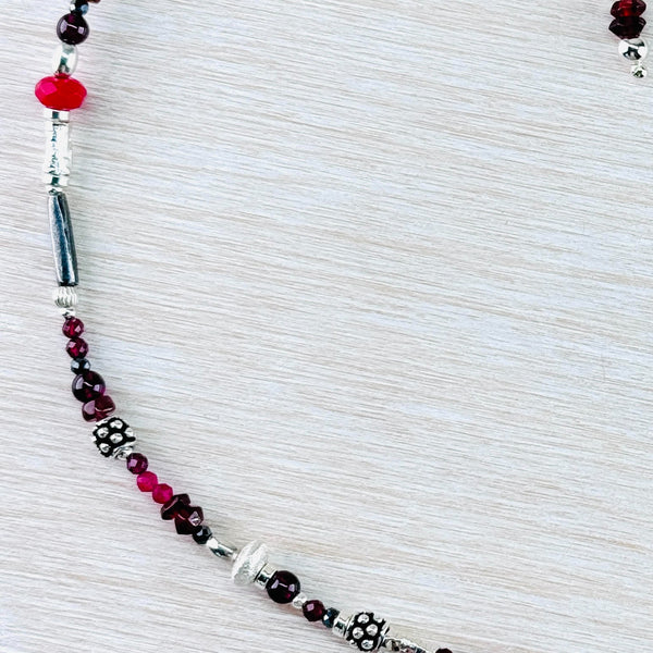 Asymetrical Garnet, Ruby, Ruby Quartz, Pink Tourmaline, Dyed Kyanite and Sterling Silver Bead Necklace by Emily Merrix.