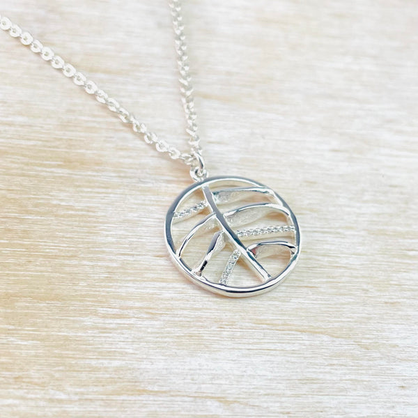 Circular Sterling Silver and Cubic Zirconia Pendant by Unique and Co.