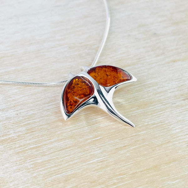 Amber and Sterling Silver Manta Ray Pendant.