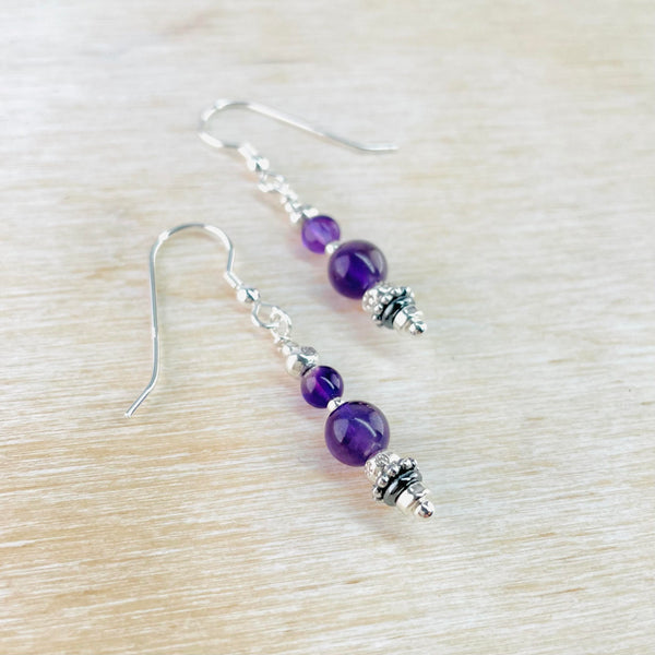 Amethyst and Decorative Sterling Silver Drop Earrings.