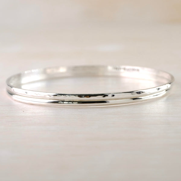 Set of 2 Separate Sterling Silver Bangle Bracelets.