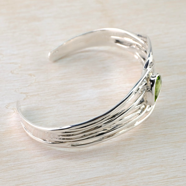 Sterling Silver and Peridot Wave Torque Bangle Bracelet.