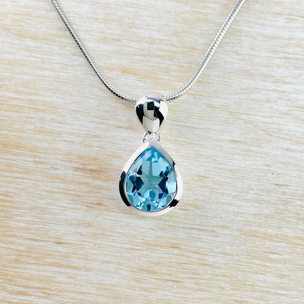 Tear Drop Blue Topaz and Sterling Silver Pendant by JB Designs.