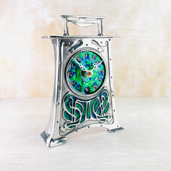 Pewter and Enamel Bracket Handle Mantel Clock in the Style of Archibald Knox.