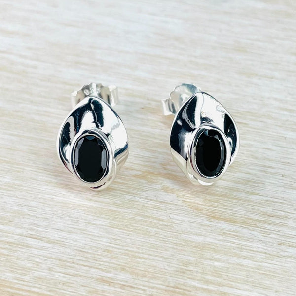 Contemporary Sterling Silver and Black Onyx Stud Earrings.