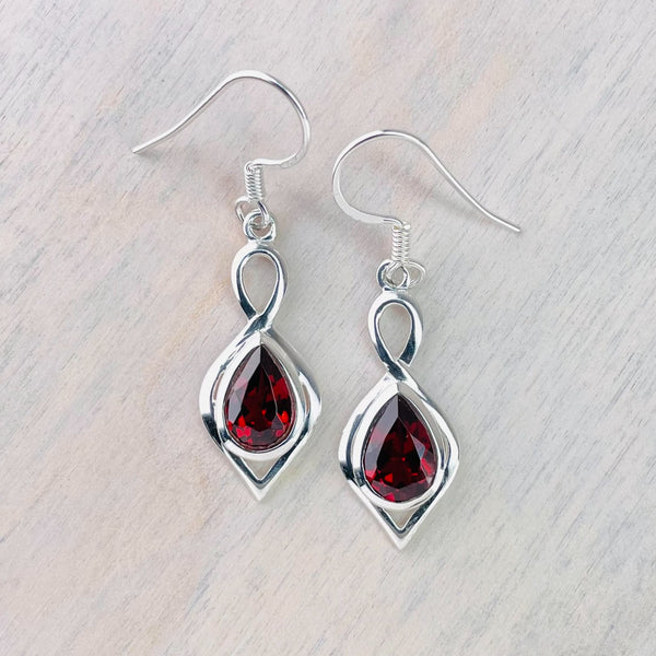 Sterling Silver and Faceted Garnet Drop Earrings.