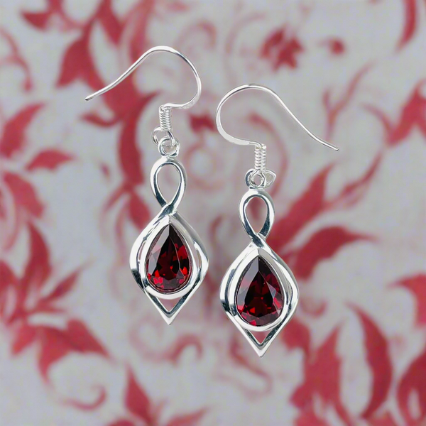 Sterling Silver and Faceted Garnet Drop Earrings.