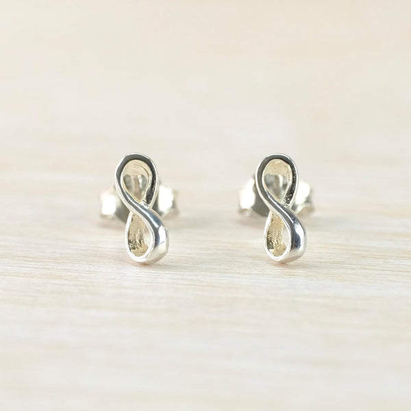 Small Polished Sterling Silver Infinity Design Stud Earrings.