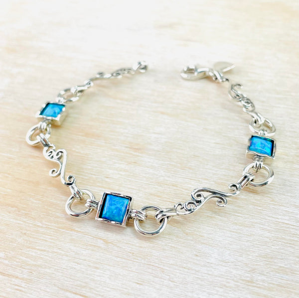 Sterling Silver Scroll and Square Opal Linked Bracelet.