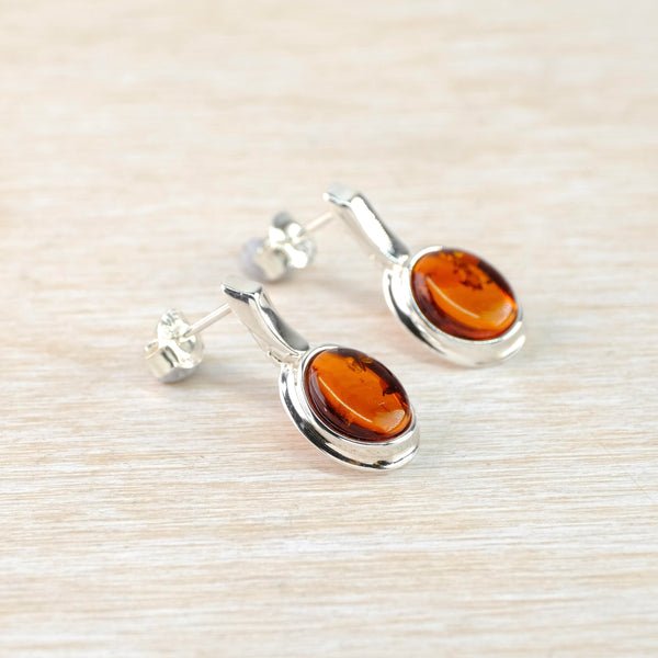 Cognac Amber and Hinged Curved Silver Post Earrings.
