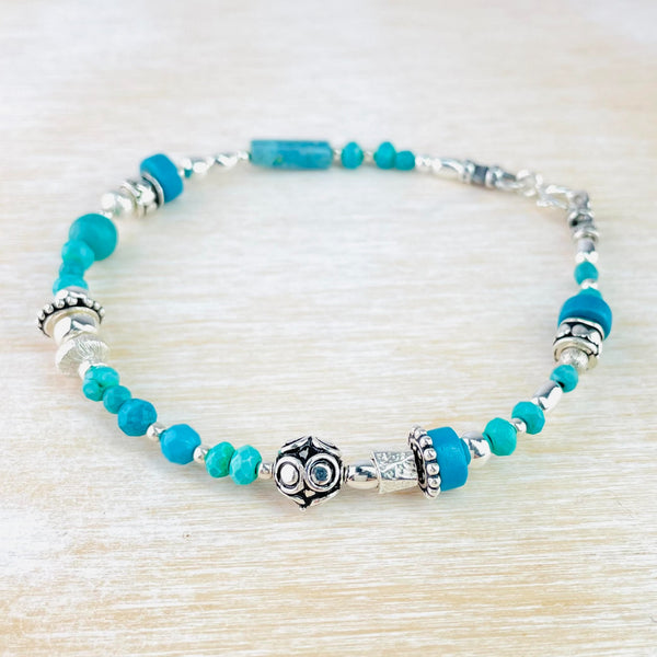 Mixed Turquoise Stones and Sterling Silver Bead Bracelet by Emily Merrix.
