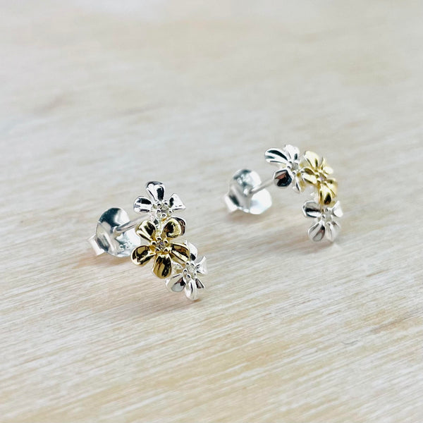 Sterling Silver and Cz Flower Stud Earrings with Gold Plated Detail.