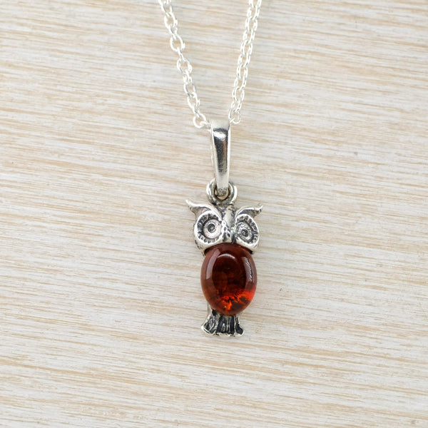 Amber and Sterling Silver Owl Pendant.