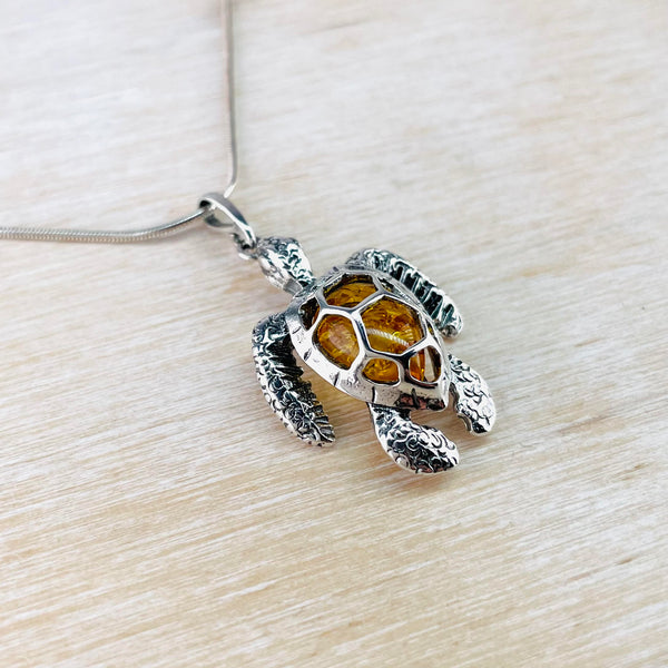Cognac Amber and Sterling Silver Turtle Pendant.
