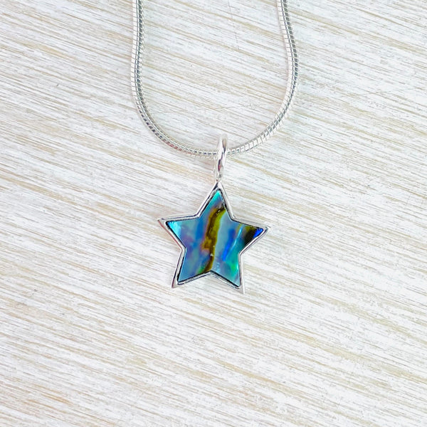 Small Sterling Silver and Abalone Star Pendant.