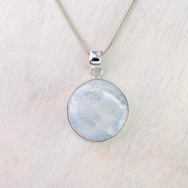 Larger Silver and Round Rainbow Moonstone Pendant.