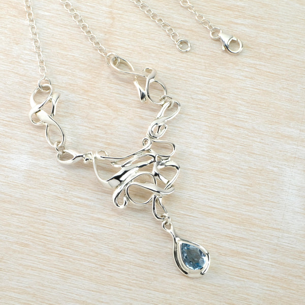 Art Nouveau Inspired Blue Topaz and Silver Statement Necklace.