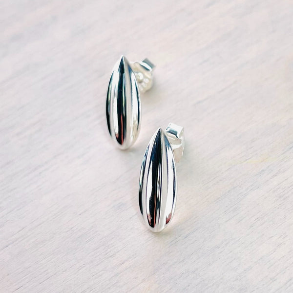 Polished Ribbed Silver Stud Earrings by JB Designs.