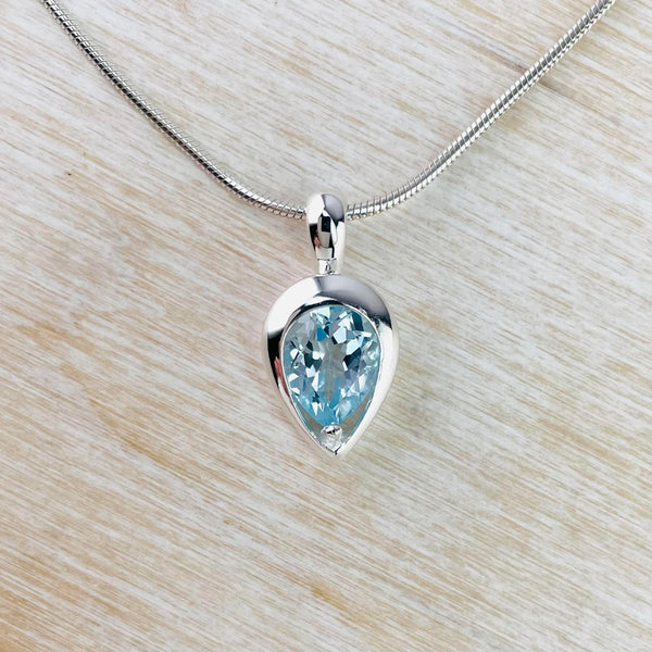 Inverted Tear Drop Blue Topaz and Sterling Silver Pendant by JB Designs.