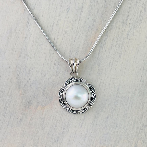 Decorative Silver and Mabe Pearl Pendant.