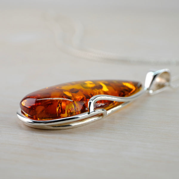 Long Elegant Cognac Amber and Silver Pendant.