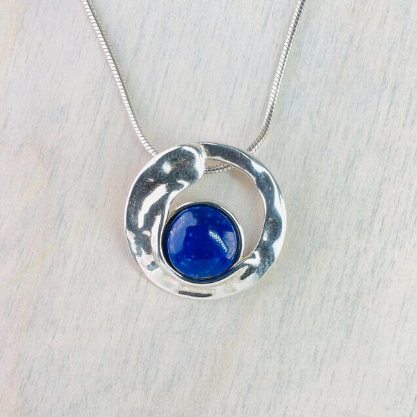 Circular Silver and Round Lapis Lazuli Pendant.