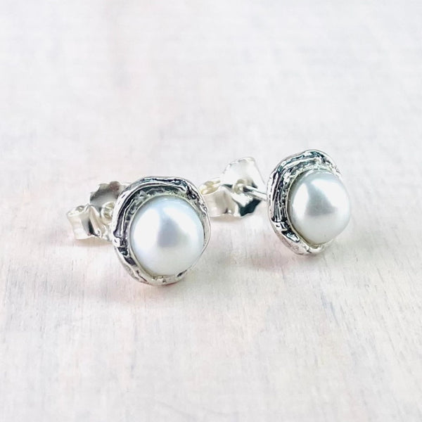 Round Sterling Silver and Freshwater Pearl Stud Earrings.