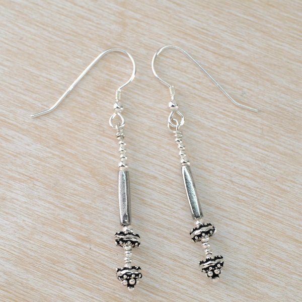 Polished and Oxidised Sterling Silver Bead Earrings by Emily Merrix.
