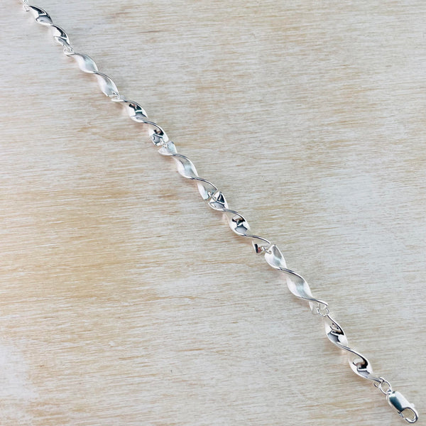 Twist Design Brushed and Polished Sterling Silver Bracelet by JB Designs.