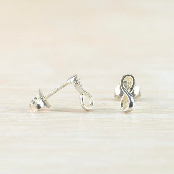Small Polished Sterling Silver Infinity Design Stud Earrings.