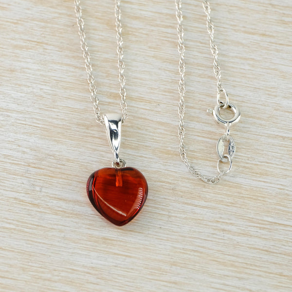 Small Amber and Sterling Silver Heart Pendant.