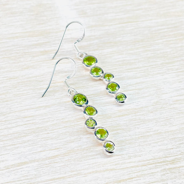 Sterling Silver Staggered Drop Faceted Peridot Earrings.