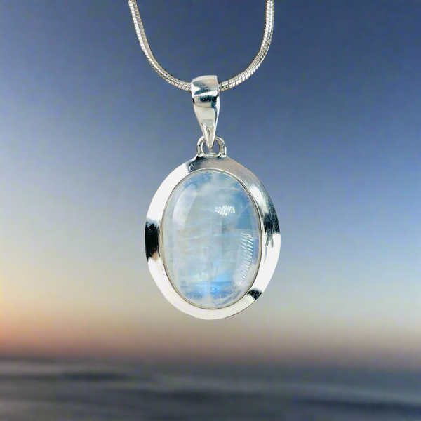 Oval Sterling Silver and Rainbow Moonstone Pendant.