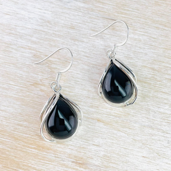 Tear Drop Black Onyx Earrings with Silver Overlay.