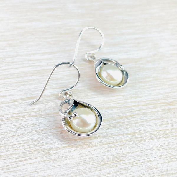 Sterling Silver and White Pearl Teardrop Earrings.