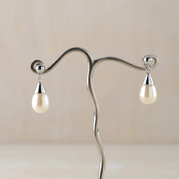 Sterling Silver and White Freshwater Pearl Drop Earrings.