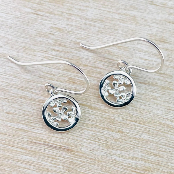 Sterling Silver Flower in a Circle Drop Earrings by JB Designs.