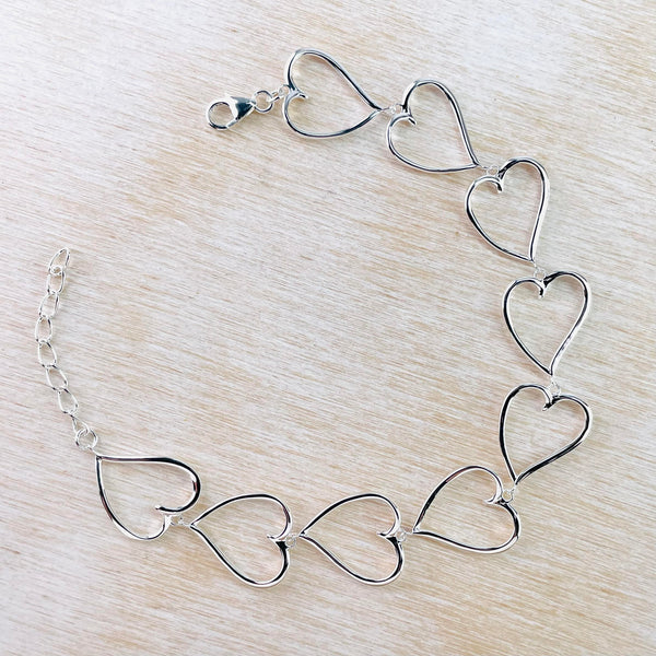 Sterling Silver Open Heart Linked Bracelet by JB Designs.