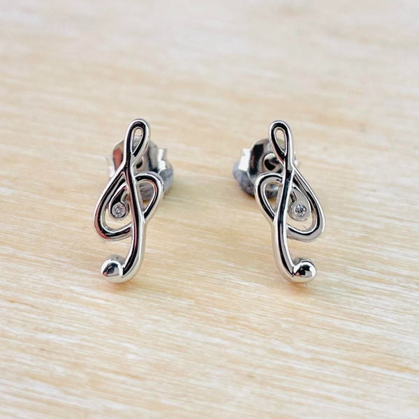Sterling Silver and Diamond Treble  Clef Stud Earrings.