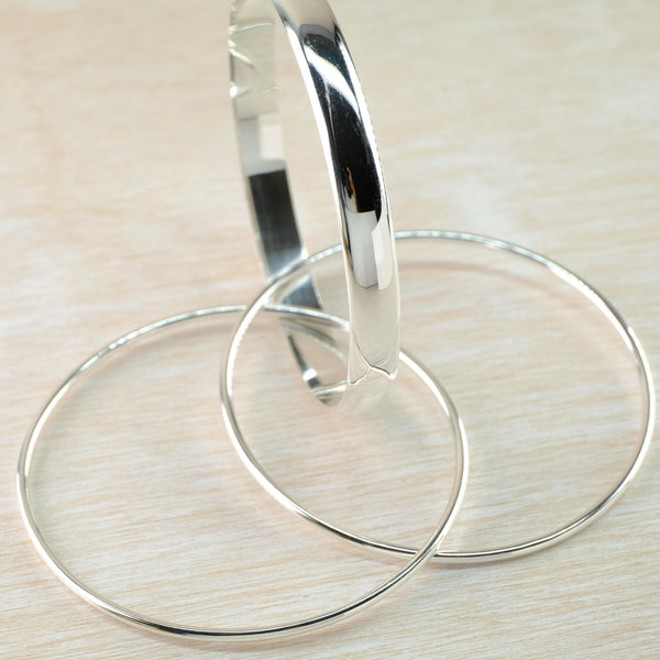 Triple Interlinked High Polished Sterling Silver Bangle Bracelets.