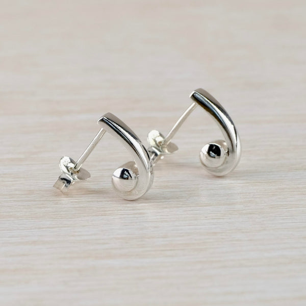 Polished Sterling Silver Curved Stud Earrings by JB Designs.